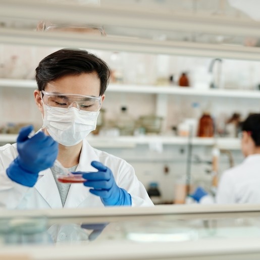 Scientist with pipette